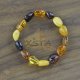 Amber bracelet with olive mix beads